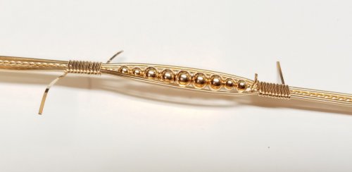 Judy Larson's Dainty Bead and Wire Bangle with Hook Closure - , Classic Wire Jewelry, Wire Wrapping, Wrapping, Wire Wrapping Jewelry, Trim the excess wire tail on the front.